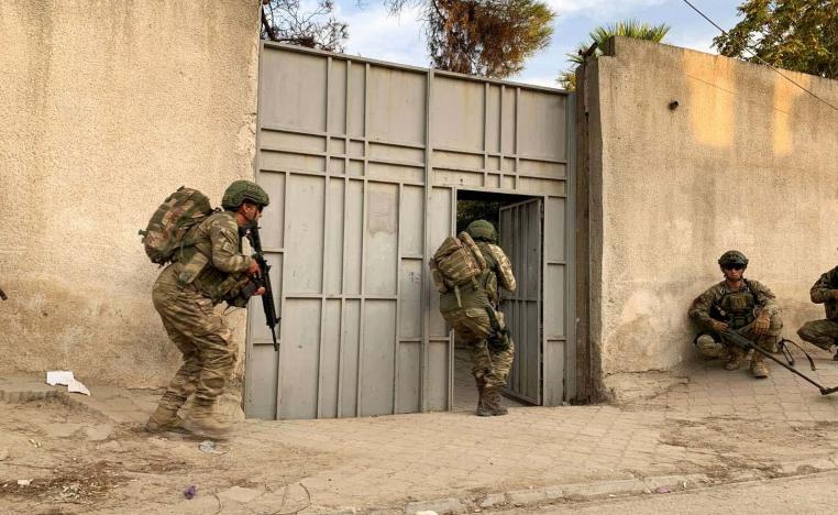 Turkish soldiers are seen in the border town of Tal Abyad, Syria