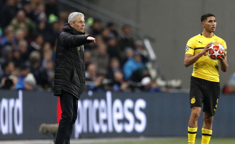 أشرف حكيمي والسويسري لوسيان فافر 