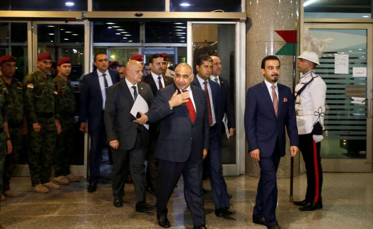 محمد الحلبوسي رئيس البرلمان العراقي (يمين) ورئيس الحكومة عادل عبدالمهدي