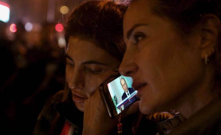 لبنانيات يستمعن لكلمة الرئيس اللبناني ميشال عون