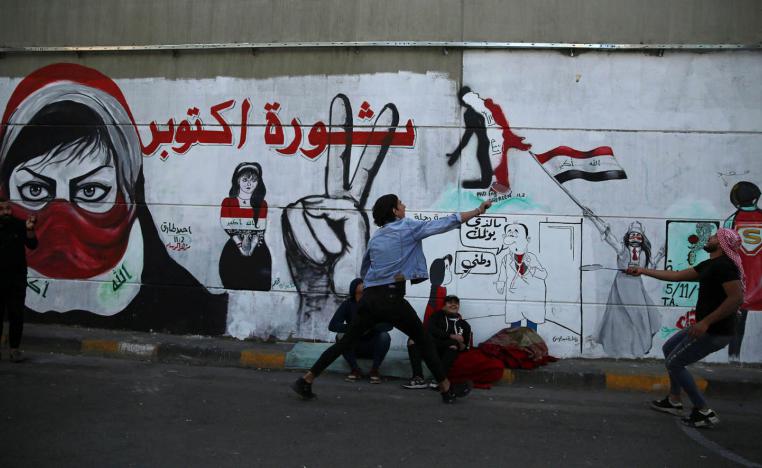 غرافيتي يشيد بالثورة العراقية في بغداد