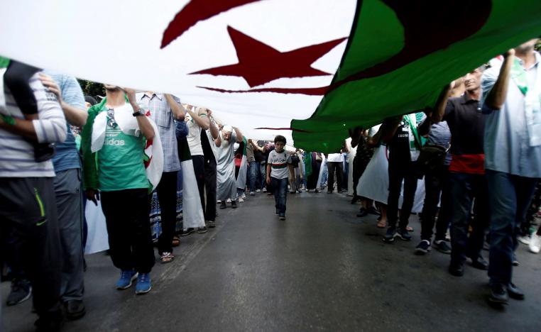 Protesters oppose the election to replace Bouteflika, saying it cannot be fair so long as his allies retain positions of power 