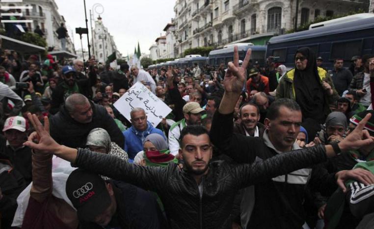 Demonstrators take to the streets in the capital Algiers to protest against the government