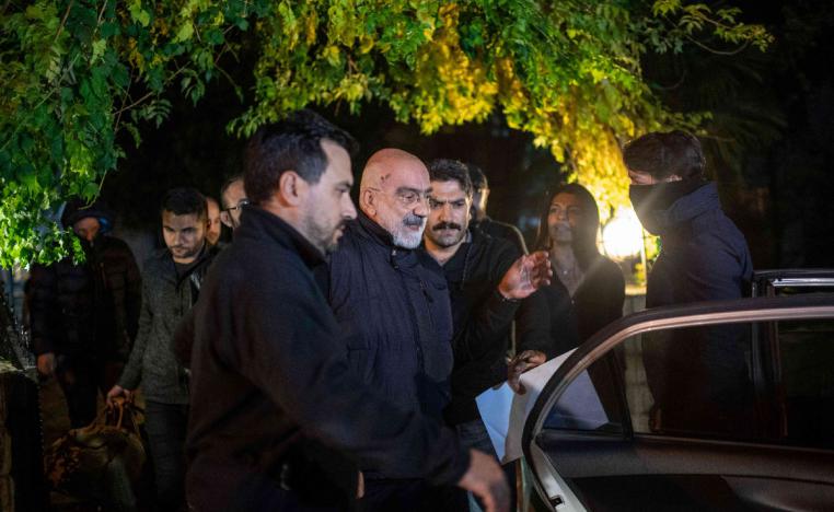 Journalist and writer Ahmet Altan (C) being detained on November 12