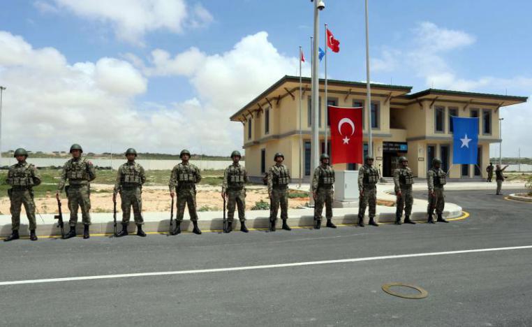 Turkish military officers parade during the opening ceremony of a Turkish military base in Mogadishu, September 30, 2017.