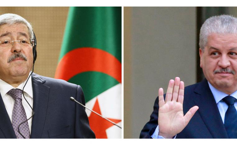Former Algerian Prime Ministers Ahmed Ouyahia (L) and Abdelmalek Sellal