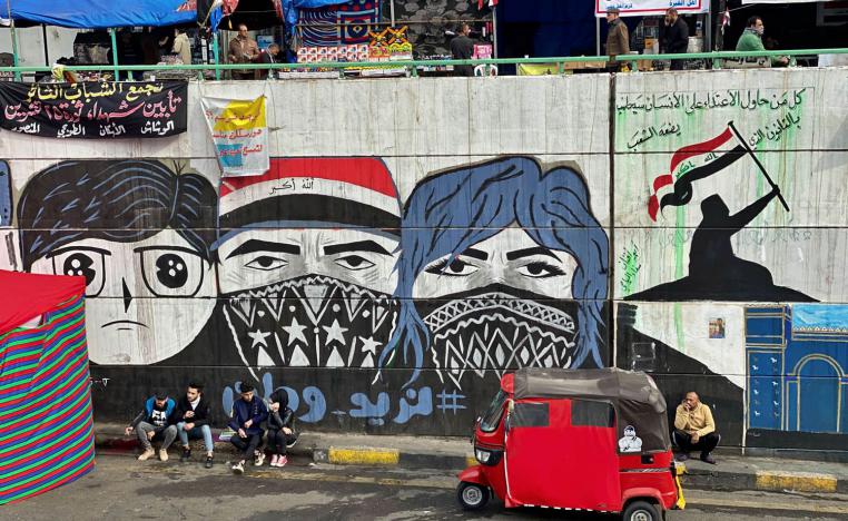 غرافيتي للمحتجين في بغداد