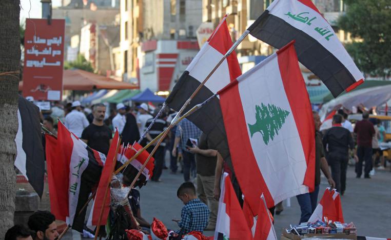 بائع لاعلام وسط بغداد