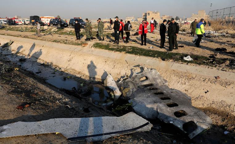 Debris at the scene where a Ukrainian plane crashed in Shahedshahr, Iran