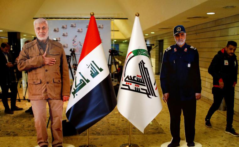 Cardboard cutouts of the late Iran's Quds Force top commander Qassem Soleimani and Iraqi militia commander Abu Mahdi al-Muhandis