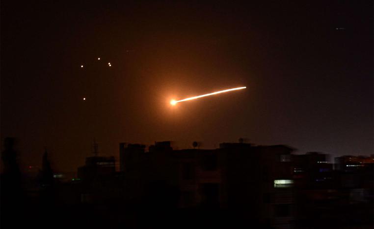 Syrian air defence intercepting an Israeli missile in the sky over the Syrian capital Damascus