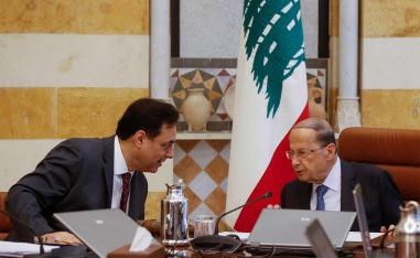 Lebanon's Prime Minister Hassan Diab speaks with Lebanon's President Michel Aoun 