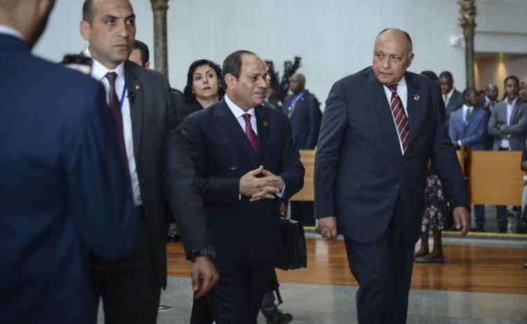 Egyptian President Abdel Fattah al-Sisi (C), the outgoing Chairman of the African Union, arrives for the opening session of the 33rd AU Summit at the AU headquarters in Addis Ababa