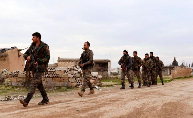 Syrian government forces patrolling the village of Tel-Toukan, in Idlib province