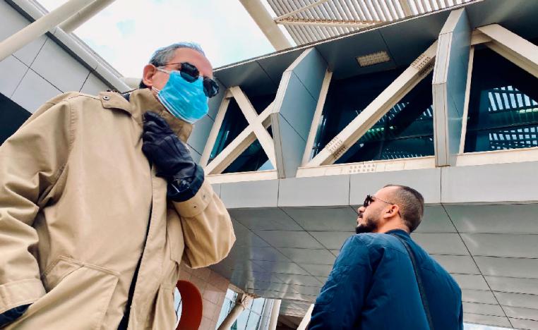 A man waits for arrivals outside the Cairo International Airport
