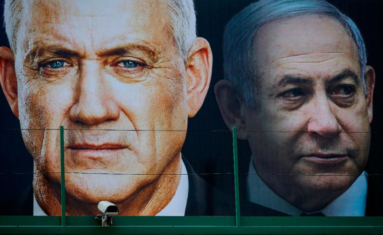 An election banner for the Israeli Blue and White political alliance