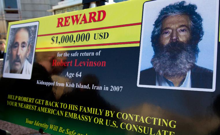 2012 photo shows an FBI poster with a composite image of former FBI agent Robert Levinson