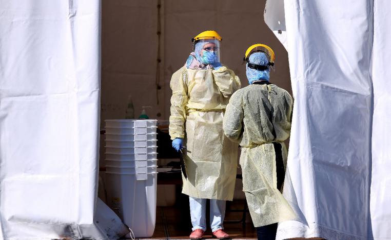 Germans pictured wearing medical suits to protect against the coronavirus