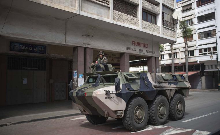 A military vehicle patrols the streets to enforce a health state of emergency and home confinement orders, in Rabat