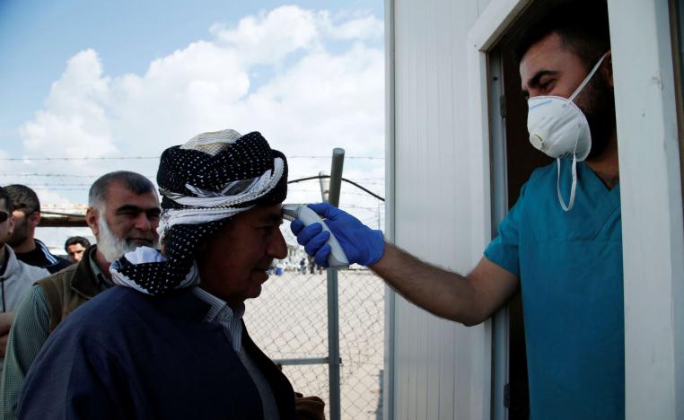 Iraqi authorities have closed land borders with Iran and banned the entry of foreign nationals travelling from there