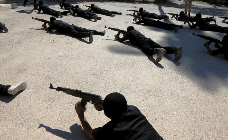  عناصر فيلق الرحمن السوري خلال تدريبات على القتال