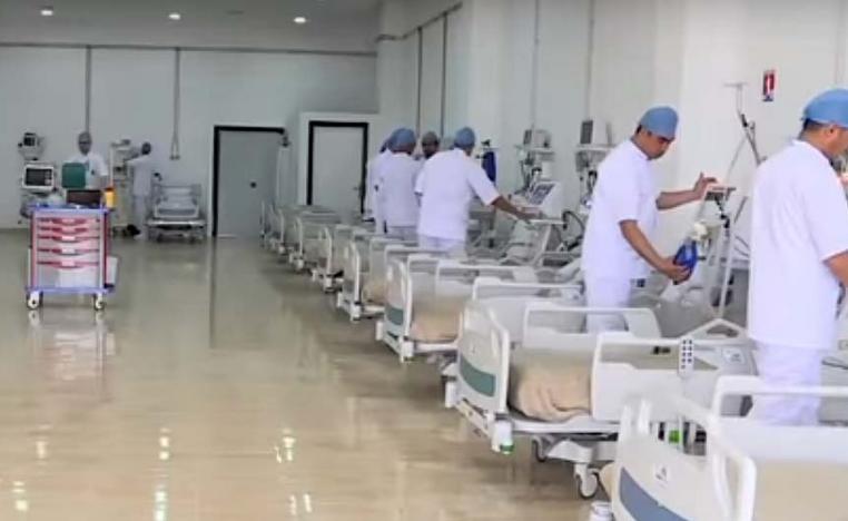Hospital beds and staff at Benslimane's military field hospital
