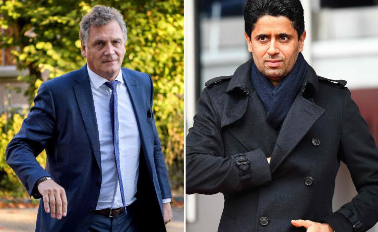 (L) French former FIFA Secretary General Jerome Valcke and (R) Paris Saint-Germain's Qatari president Nasser Al-Khelaifi 