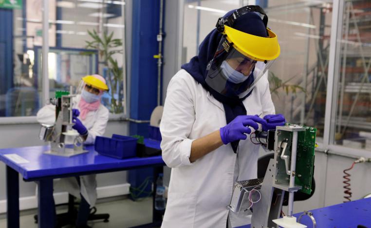 Employees work on a Moroccan ventilator at a factory in Casablanca
