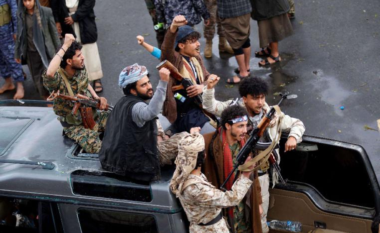 Yemeni Huthi rebels take part in a demonstration