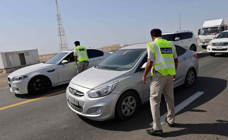 mirati security forces man a checkpoint at the entrance of Abu Dhabi