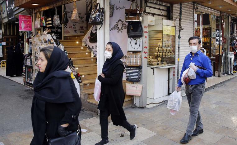 Iranians wearing protective face masks in Tehran