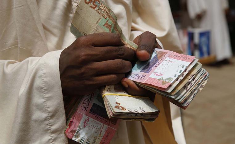 Sudanese pound's official rate is 55 to the US dollar, compared to 140 on the black market