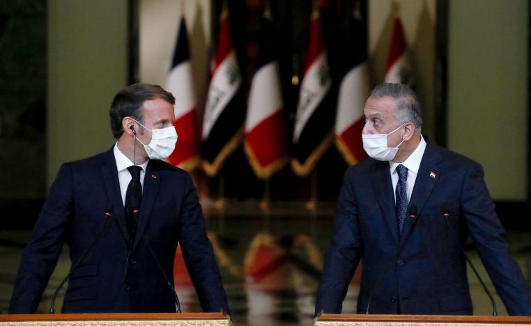 الرئيس الفرنسي ايمانويل ماكرون ورئيس الوزراء العراقي مصطفى الكاظمي في مؤتمر صحفي في بغداد