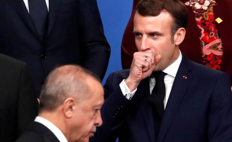 الرئيس الفرنسي ايمانويل ماكرون والرئيس التركي رجب طيب أردوغان في اجتماع الناتو (2019)