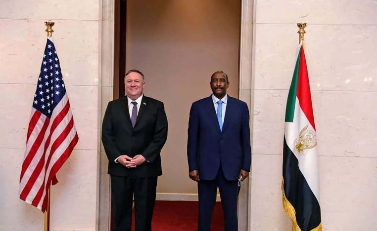 US Secretary of State Mike Pompeo stands with Sudanese Gen. Abdel-Fattah Burhan, the head of the ruling sovereign council