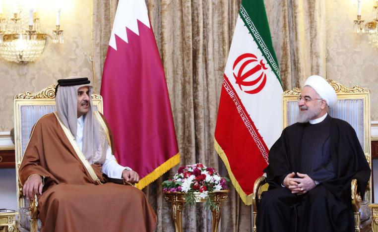 امير قطر الشيخ تميم بن حمد ال ثاني والرئيس الايراني حسن روحاني