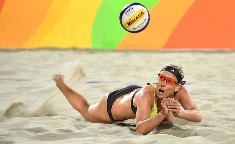 Beach volleyball players cleared to wear bikinis in Qatar event