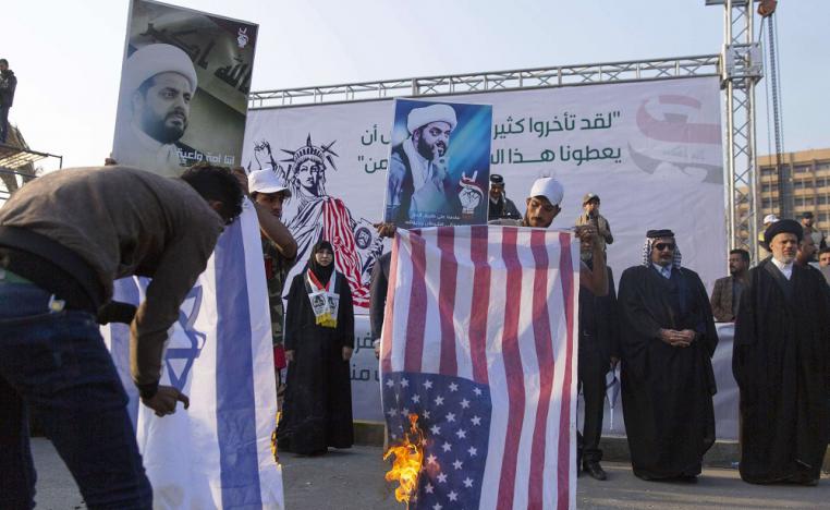 أذرع إيران تلوح بالعنف للدفع نحو إخراج القوات الأميركية من العراق