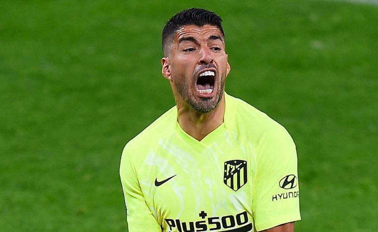 أتلتيكو يأمل الاستفادة من هدية غرناطة الفائز على برشلونة