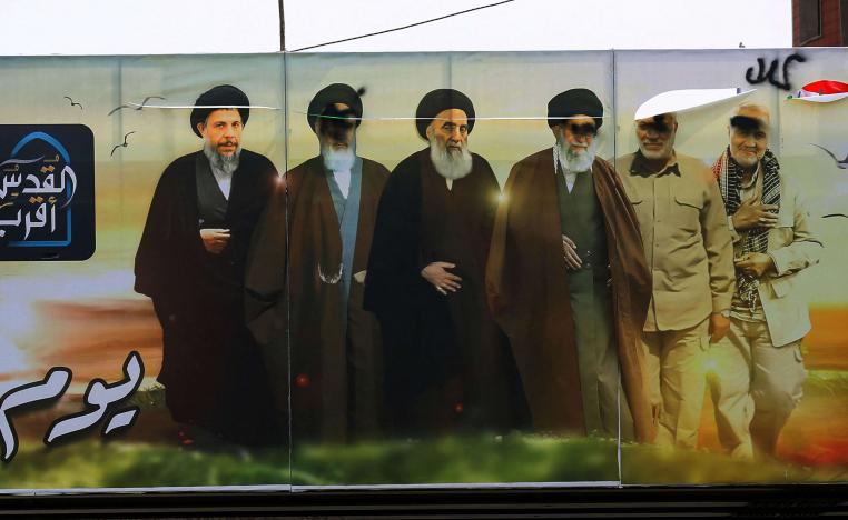 تشويه لصور قادة شيعة عراقيين وإيرانيين وسط بغداد