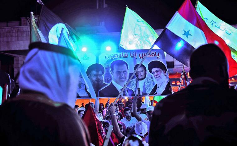 متظاهرون في يوم القدس يرفعون صور حلفاء إيران في المنطقة