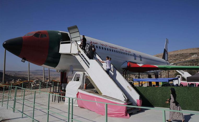 Many visitors come to take photos inside the plane at a price of five shekels (about $1.50) per person