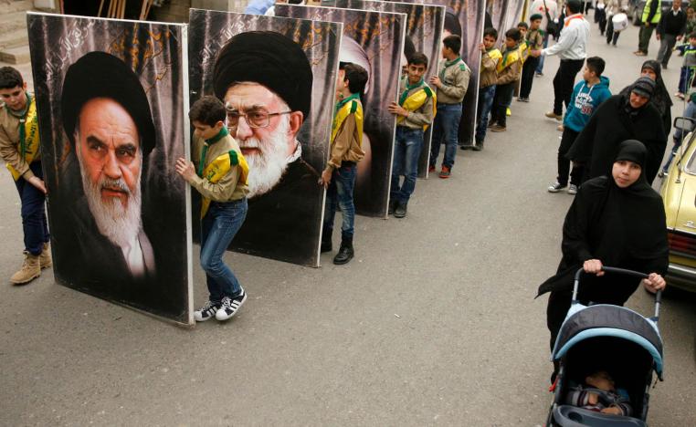 مسيرة لحزب الله في لبنان ترفع صورا لقادة ايرانيين