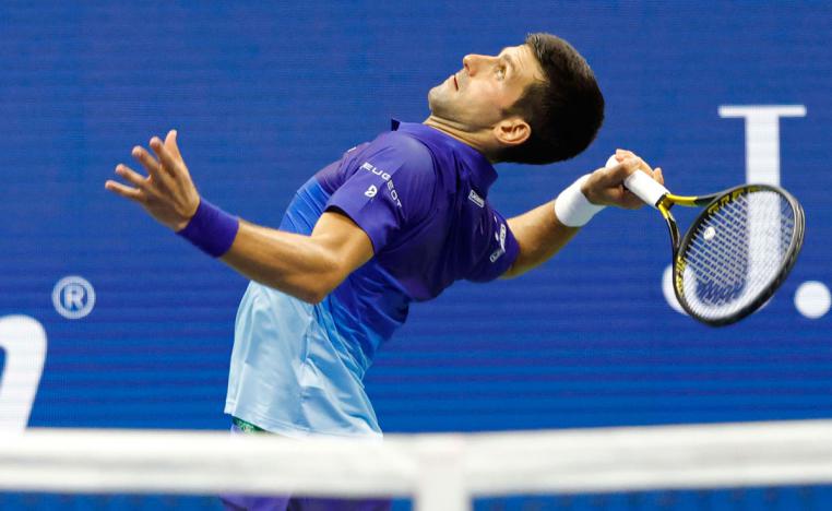 لاعب التنس الصربي لاحراز اللقب وفك ارتباطه مع الغائبين السويسري فيدرر والاسباني نادال