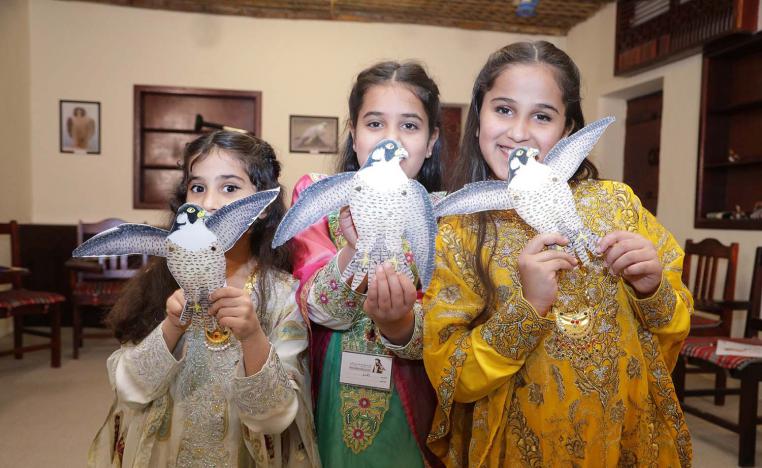 Learning about falconry from a very young age in the UAE