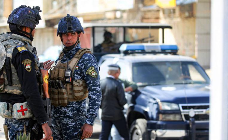 شرطة عراقية في نقطة تفتيش وسط بغداد