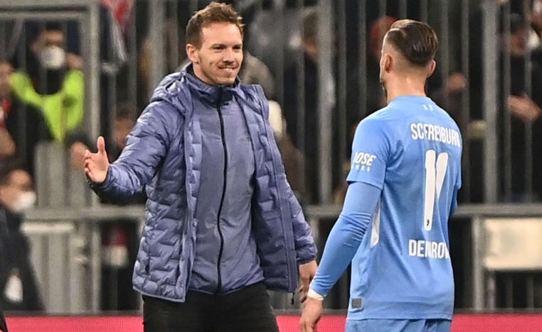 بايرن للتعملق على ارض أوغسبورغ