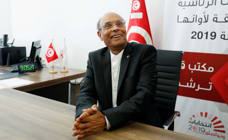 There were no details on what charge Marzouki faced