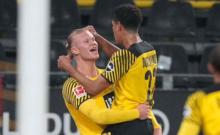 ثنائية لكل من هالاند ومونييه 