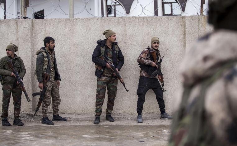 Dozens of armed Islamic State militants remained holed up in Gweiran prison